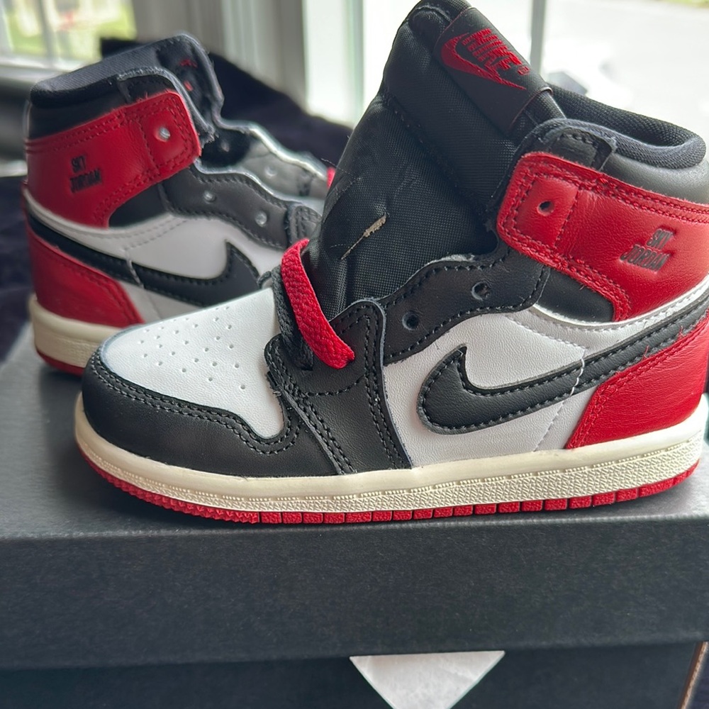 Jordan 1 Retro High OG in Black, Red, and White. New in Box